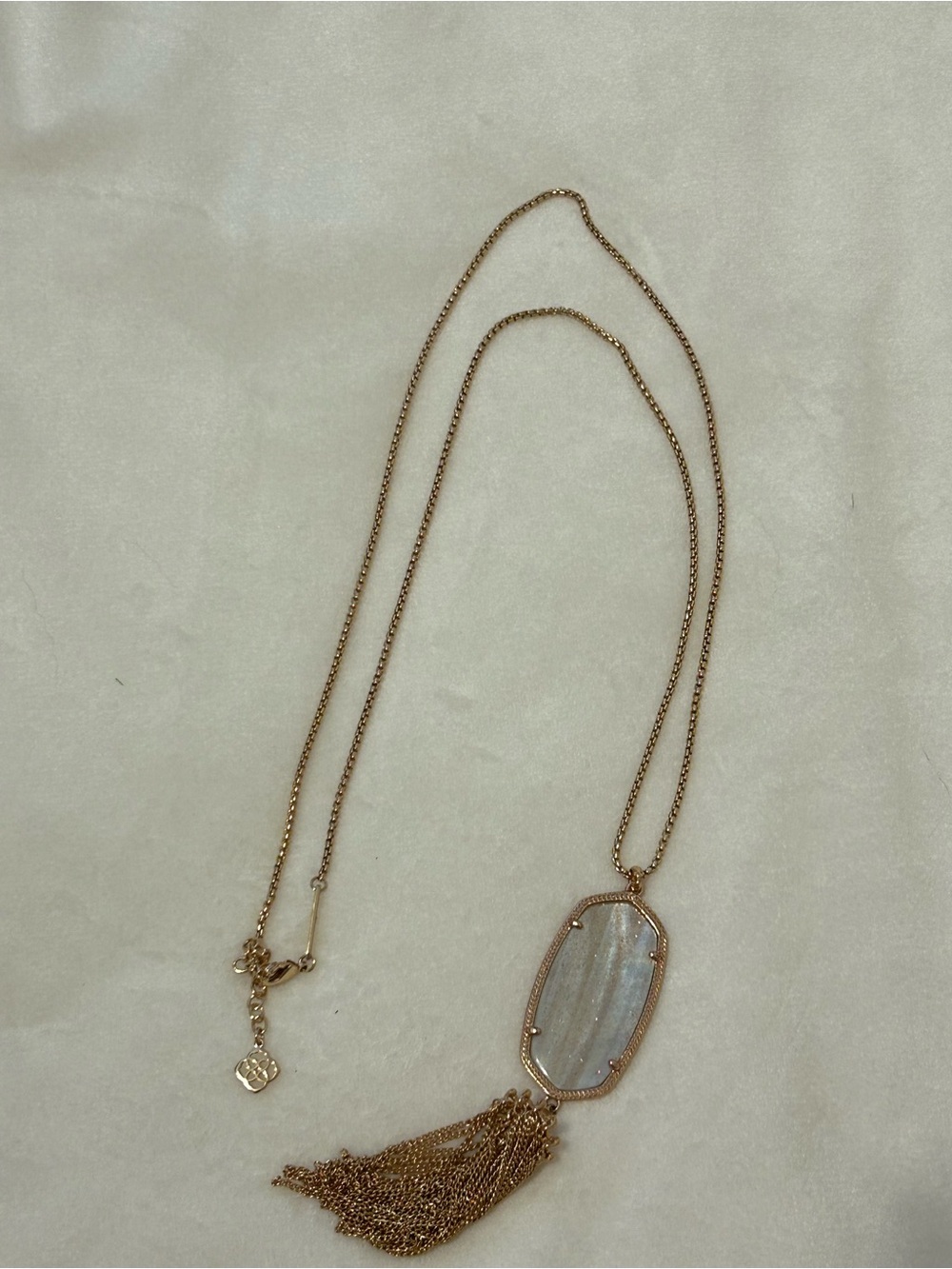 Kendra Scott rose gold Tassel Pendant Necklace with gold dusted pink stone